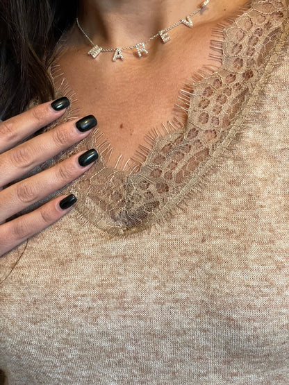 Haut dentelle beige